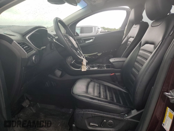 2019 Ford Edge SEL with VIN 2FMPK4J92KBB34891, listed as a Copart auction lot 60050945 with 104,942 mi miles and Salvage title. Bid and sale history available at DreamBid. Image 7.