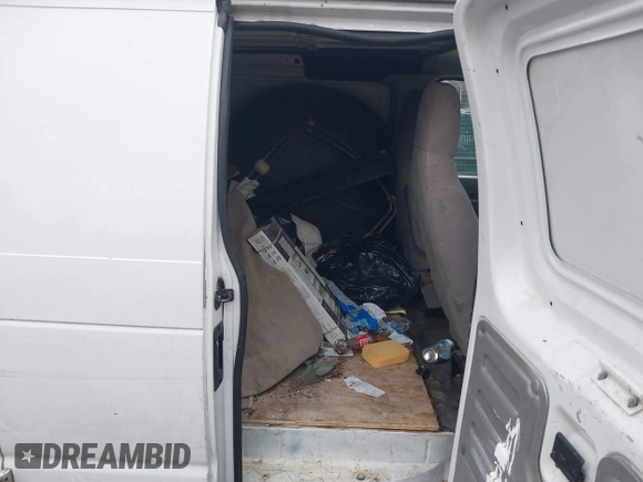 2012 Ford Econoline Cargo Super Duty Commercial with VIN 1FTSE3EL2CDA52905, listed as a IAAI auction lot 41515331 with 143,857 mi miles and . Bid and sale history available at carsss.com. Image 8.