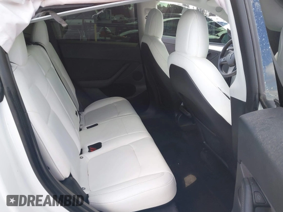2022 Tesla Model Y Performance with VIN 7SAYGDEF1NF559572, listed as a IAAI auction lot 41516070 with 43,240 mi miles and . Bid and sale history available at DreamBid. Image 8.