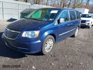 2015 Chrysler Town & Country Touring-L with VIN 2C4RC1CG0FR673981, listed as a IAAI auction lot 41773997 with 107,705 mi miles. Bid and sale history available at carsss.com. Image 2.
