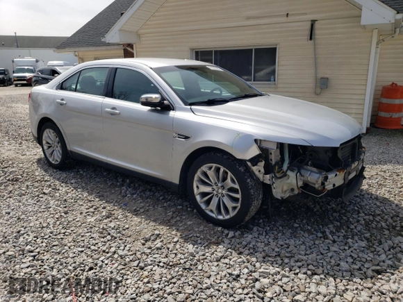 2014 Ford Taurus Limited with VIN 1FAHP2F83EG106227, listed as a Copart auction lot 63055365 with 194,026 mi miles and Salvage title. Bid and sale history available at DreamBid. Image 4.