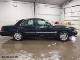 2009 Mercury Grand Marquis LS with VIN 2MEHM75V39X602084, listed as a IAAI auction lot 41615859 with 102,051 mi miles. Bid and sale history available at carsss.com. Image 13.