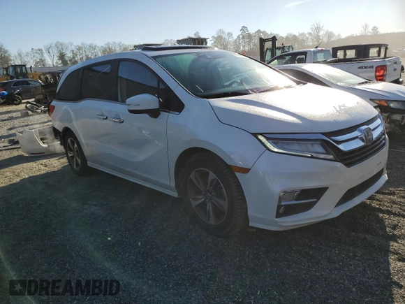 2018 Honda Odyssey Touring с VIN 5FNRL6H8XJB002031, выставлен на аукционе Copart как лот 49996105 с пробегом 202 284 миль миль и Чистый • Clean title. История ставок и продаж доступна на DreamBid. Изображение 4.