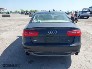 2012 Audi A6 3.0T Prestige with VIN WAUHGBFC8CN078333, listed as a IAAI auction lot 42001507 with 121,527 mi miles. Bid and sale history available at carsss.com. Image 16.
