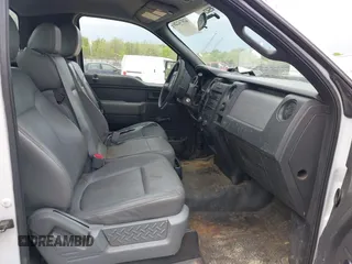 2012 Ford F-150 XL with VIN 1FTMF1CM7CKD06576, listed as a IAAI auction lot 42074226 with 294,349 mi miles. Bid and sale history available at carsss.com. Image 5.