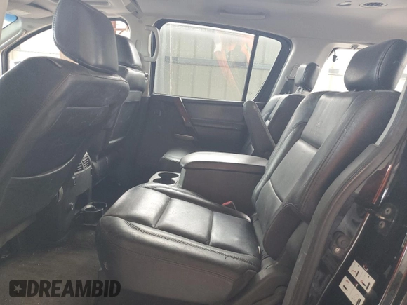 2007 Infiniti QX56 z VIN 5N3AA08A07N802904, wystawiony jako Copart lot #52902755 z przebiegiem 148 215 mil mil oraz Szkoda całkowita • Salvage title. Historia ofert i sprzedaży dostępna na DreamBid. Obrazek 11.