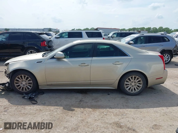 2013 Cadillac CTS Luxury with VIN 1G6DE5E55D0120843, listed as a IAAI auction lot 42145982 with 147,127 mi miles and . Bid and sale history available at DreamBid. Image 14.