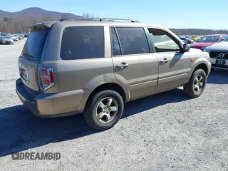 2008 Honda Pilot EX-L with VIN 5FNYF18778B052859, listed as a IAAI auction lot 41695095 with 249,207 mi miles and . Bid and sale history available at DreamBid. Image 4.
