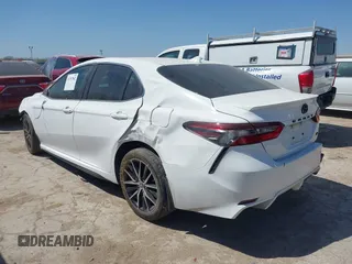 2023 Toyota Camry SE z VIN 4T1G11AK1PU774077, wystawiony jako IAAI lot #41747862 z przebiegiem 63 106 mil mil oraz . Historia ofert i sprzedaży dostępna na DreamBid. Obrazek 3.