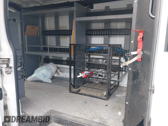 2016 Ford Transit Cargo z VIN 1FTBW2CM4GKA02611, wystawiony jako IAAI lot #41845080 z przebiegiem 175 109 mil mil oraz . Historia ofert i sprzedaży dostępna na DreamBid. Obrazek 7.