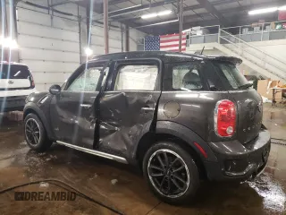 2015 MINI Cooper Countryman S with VIN WMWZC5C51FWM18945, listed as a Copart auction lot 45018755 with 135,086 mi miles and Salvage Title. Bid and sale history available at carsss.com. Image 2.