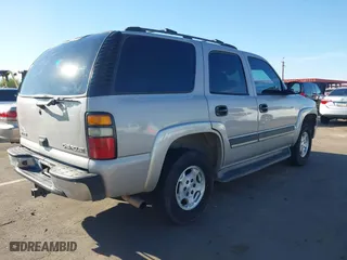 2005 Chevrolet Tahoe LS with VIN 1GNEK13T95J124661, listed as a IAAI auction lot 41885297 with 309,905 mi miles. Bid and sale history available at carsss.com. Image 4.