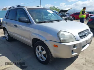 2005 Hyundai Tucson GL with VIN KM8JM12B95U097899, listed as a IAAI auction lot 41953290 with 111,090 mi miles. Bid and sale history available at carsss.com. Image 1.