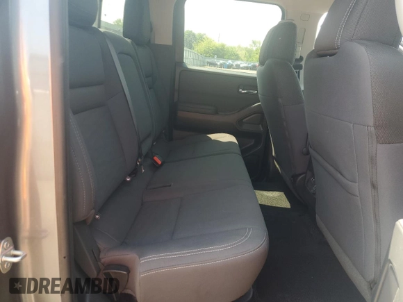 2024 Nissan Frontier SV with VIN 1N6ED1FKXRN605620, listed as a Copart auction lot 59854695 with 8,828 mi miles and Salvage title. Bid and sale history available at DreamBid. Image 10.