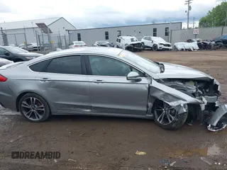 2020 Ford Fusion Titanium with VIN 3FA6P0D98LR115437, listed as a IAAI auction lot 42331052 with 127,346 mi miles and . Bid and sale history available at DreamBid. Image 13.