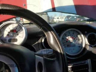 2003 MINI Hardtop S with VIN WMWRE33433TD64067, listed as a Copart auction lot 42572405 with 182,294 mi miles and Salvage Title. Bid and sale history available at DreamBid. Image 9.
