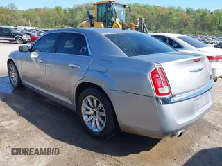 2013 Chrysler 300 C with VIN 2C3CCAEG7DH727559, listed as a IAAI auction lot 41990806 with 201,182 mi miles and . Bid and sale history available at DreamBid. Image 3.