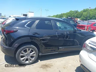 2022 Mazda CX-30 S Carbon Edition with VIN 3MVDMBCL3NM440188, listed as a IAAI auction lot 42259723 with 48,555 mi miles and . Bid and sale history available at DreamBid. Image 14.