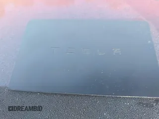 2018 Tesla Model 3 Long Range Battery with VIN 5YJ3E1EA0JF153146, listed as a IAAI auction lot 41621919 with 76,794 mi miles and . Bid and sale history available at DreamBid. Image 11.