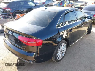 2016 Audi A4 Premium with VIN WAUAFAFL6GN007121, listed as a IAAI auction lot 41934404 with 60,740 mi miles. Bid and sale history available at carsss.com. Image 4.