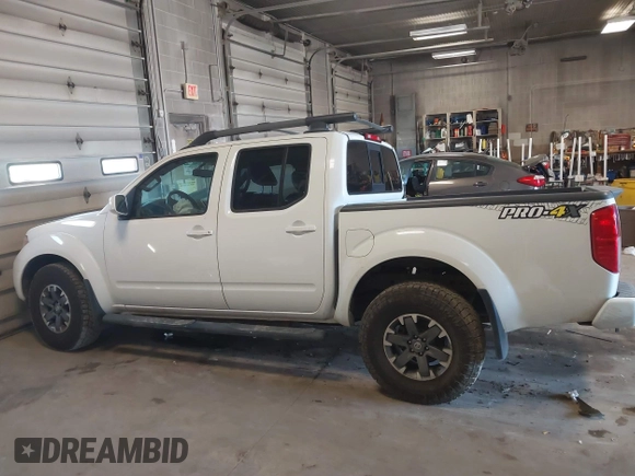 2014 Nissan Frontier SV with VIN 1N6AD0EV4EN736220, listed as a IAAI auction lot 41241823 with 91,789 mi miles and . Bid and sale history available at DreamBid. Image 14.