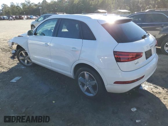 2015 Audi Q3 Premium Plus with VIN WA1BFCFS7FR014199, listed as a Copart auction lot 81987154 with 62,071 mi miles and Salvage title. Bid and sale history available at DreamBid. Image 2.