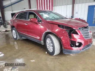 2017 Cadillac XT5 FWD with VIN 1GYKNARS6HZ193356, listed as a Copart auction lot 58356665 with 122,606 mi miles and Salvage title. Bid and sale history available at DreamBid. Image 4.