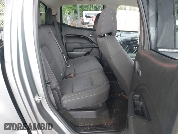 2018 Chevrolet Colorado 4WD LT z VIN 1GCGTCEN6J1146104, wystawiony jako IAAI lot #42338356 z przebiegiem 71 043 mil mil oraz . Historia ofert i sprzedaży dostępna na DreamBid. Obrazek 8.