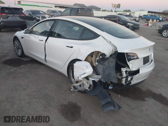 2021 Tesla Model 3 Standard Range Plus z VIN 5YJ3E1EA3MF043860, wystawiony jako IAAI lot #41214748 z przebiegiem 32 753 mil mil oraz . Historia ofert i sprzedaży dostępna na DreamBid. Obrazek 6.