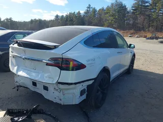 2021 Tesla Model X Long Range Plus with VIN 5YJXCDE29MF316169, listed as a IAAI auction lot 41232066 with 53,235 mi miles and . Bid and sale history available at carsss.com. Image 4.