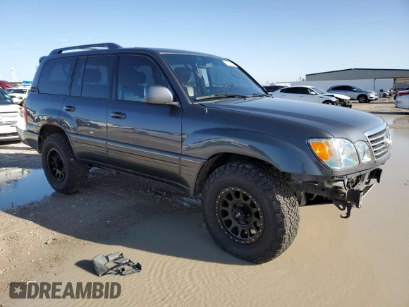 2006 Lexus LX 470 z VIN JTJHT00W664007502, wystawiony jako Copart lot #47871885 z przebiegiem 172 552 mil mil oraz Szkoda całkowita • Salvage title. Historia ofert i sprzedaży dostępna na DreamBid. Obrazek 4.