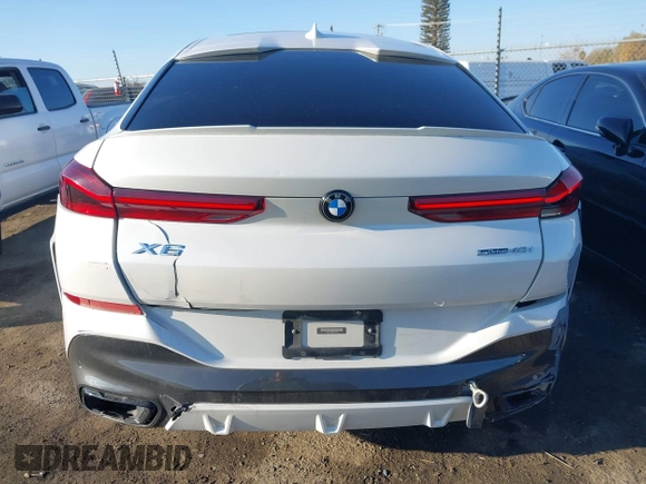2021 BMW X6 sDrive40i z VIN 5UXCY4C06M9E16162, wystawiony jako IAAI lot #41279040 z przebiegiem 94 494 mil mil oraz . Historia ofert i sprzedaży dostępna na DreamBid. Obrazek 16.