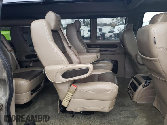 2019 Chevrolet Express Cargo z VIN 1GCWGBFG9K1233619, wystawiony jako Copart lot #78674184 z przebiegiem 102 580 mil mil oraz Szkoda całkowita • Salvage title. Historia ofert i sprzedaży dostępna na DreamBid. Obrazek 11.