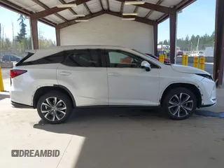 2021 Lexus RX with VIN JTJHZKFA2M2030841, listed as a IAAI auction lot 42009263 with 38,113 mi miles. Bid and sale history available at carsss.com. Image 14.