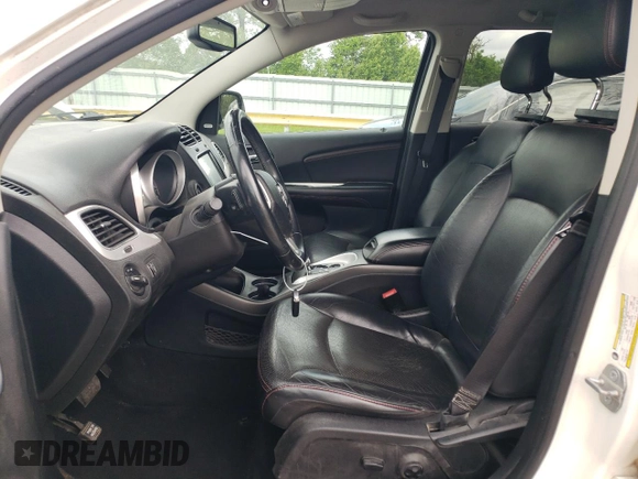 2014 Dodge Journey R/T z VIN 3C4PDCEG4ET308051, wystawiony jako Copart lot #54906995 z przebiegiem 173 960 mil mil oraz Szkoda całkowita • Salvage title. Historia ofert i sprzedaży dostępna na DreamBid. Obrazek 7.