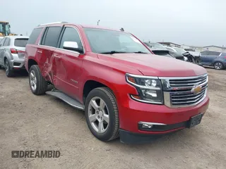2015 Chevrolet Tahoe LTZ z VIN 1GNSKCKC9FR188072, wystawiony jako IAAI lot #41938831 z przebiegiem 204 739 mil mil oraz . Historia ofert i sprzedaży dostępna na DreamBid. Obrazek 1.