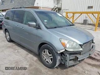 2007 Honda Odyssey EX-L z VIN 5FNRL38757B000542, wystawiony jako IAAI lot #42255008 z przebiegiem 131 451 mil mil oraz . Historia ofert i sprzedaży dostępna na DreamBid. Obrazek 1.