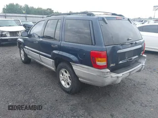 2000 Jeep Grand Cherokee Laredo with VIN 1J4G248S4YC144404, listed as a IAAI auction lot 42114635 with 181,854 mi miles and . Bid and sale history available at DreamBid. Image 3.