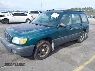 2001 Subaru Forester L with VIN JF1SF635X1H717371, listed as a IAAI auction lot 41719771 with 221,590 mi miles. Bid and sale history available at carsss.com. Image 2.