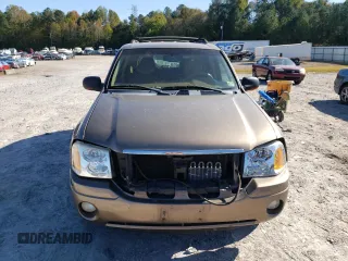 2002 GMC Envoy SLT with VIN 1GKDT13S022456264, listed as a Copart auction lot 76556004 with 230,954 mi miles and Salvage Title. Bid and sale history available at DreamBid. Image 5.