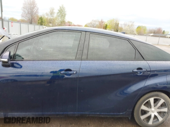 2016 Toyota Mirai with VIN JTDBVRBD6GA000989, listed as a IAAI auction lot 41978253 with 63,682 mi miles and . Bid and sale history available at DreamBid. Image 6.