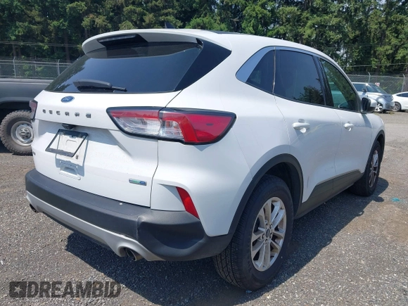 2020 Ford Escape SE with VIN 1FMCU9G67LUA79806, listed as a IAAI auction lot 42560963 with 103,070 mi miles and . Bid and sale history available at DreamBid. Image 4.
