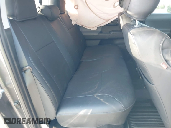 2021 Toyota Tacoma SR with VIN 3TYAX5GN5MT032481, listed as a IAAI auction lot 41979320 with 51,843 mi miles and . Bid and sale history available at DreamBid. Image 8.