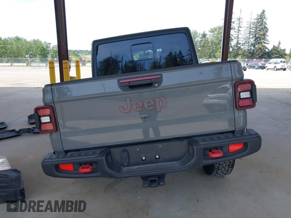 2022 Jeep Gladiator Rubicon with VIN 1C6JJTBG6NL166081, listed as a IAAI auction lot 42204431 with 40,568 mi miles and . Bid and sale history available at DreamBid. Image 17.