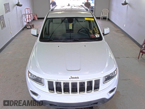 2014 Jeep Grand Cherokee Laredo with VIN 1C4RJFAG2EC198265, listed as a IAAI auction lot 42222664 with 117,447 mi miles and . Bid and sale history available at DreamBid. Image 1.
