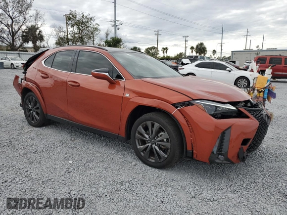 2023 Lexus UX 250h F Sport with VIN JTHR6JBHXP2143632, listed as a Copart auction lot 86048654 with 29,481 mi miles and Salvage title. Bid and sale history available at DreamBid. Image 4.