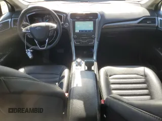 2020 Ford Fusion SEL z VIN 3FA6P0CD7LR196193, wystawiony jako Copart lot #53254465 z przebiegiem 79 944 mil mil oraz Szkoda całkowita • Salvage title. Historia ofert i sprzedaży dostępna na DreamBid. Obrazek 8.