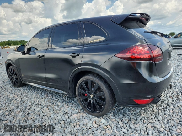 2013 Porsche Cayenne GTS с VIN WP1AD2A25DLA75526, выставлен на аукционе Copart как лот 60520865 с пробегом Не указан миль и Списание • Salvage title. История ставок и продаж доступна на DreamBid. Изображение 2.