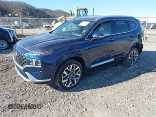 2021 Hyundai Santa Fe Calligraphy z VIN 5NMS5DAL4MH352689, wystawiony jako IAAI lot #41740911 z przebiegiem 15 589 mil mil oraz . Historia ofert i sprzedaży dostępna na DreamBid. Obrazek 2.