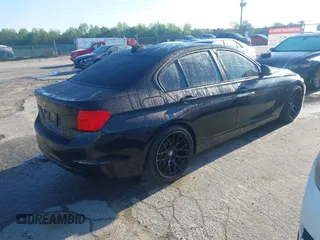 2013 BMW 3 Series 328i with VIN WBA3C1C50DF435473, listed as a IAAI auction lot 41981570 with 135,227 mi miles. Bid and sale history available at carsss.com. Image 4.